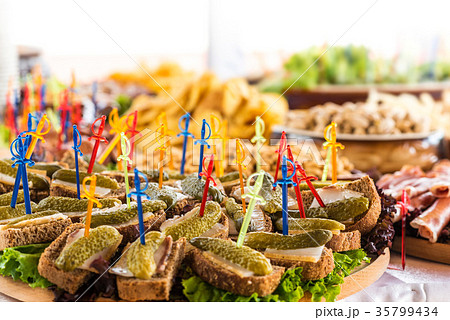 Buffet table with canapes Buffet table with canapes 35799434