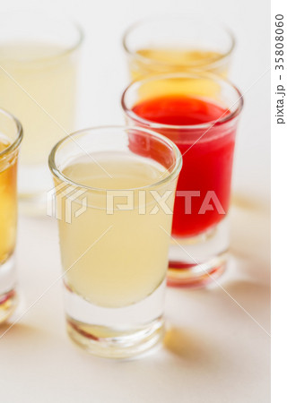 Glasses with alcoholic drink Glasses with alcoholic drink 35808060
