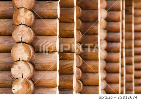 Natural background pattern of a log wall Natural background pattern of a log wall 35812674