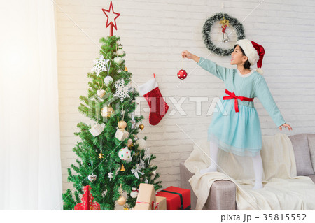 a little cute girl sitting on the floor 35815552