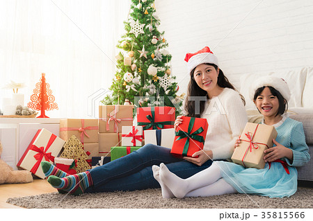 a little cute girl sitting on the floor a little cute girl sitting on the floor 35815566
