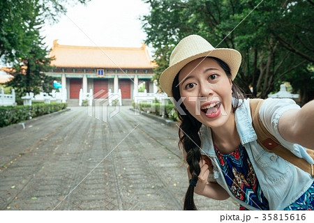 tourist taking smartphone picture on travel tourist taking smartphone picture on travel 35815616