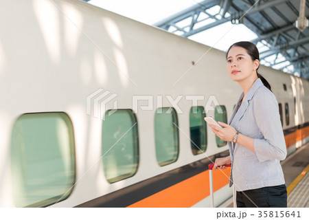 Asian woman waiting for her train arrival 35815641