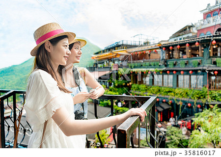 girls looking at landmarks tea house views girls looking at landmarks tea house views 35816017