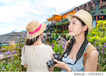 two Asian girls visiting the famous landmarks two Asian girls visiting the famous landmarks 35816021