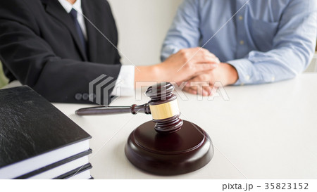 Judge gavel with lawyers advice legal at law firm in background. Judge gavel with lawyers advice legal at law firm in background. 35823152