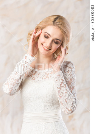 fashionable white gown, beautiful blonde model 35830083