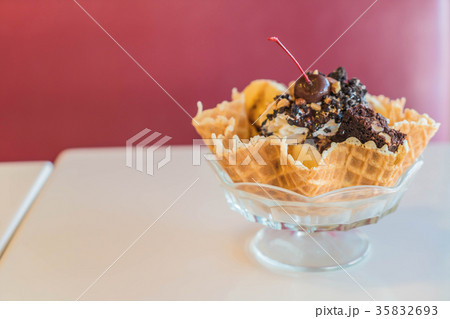 Ice Cream Sundae in an edible waffle bowl Ice Cream Sundae in an edible waffle bowl 35832693