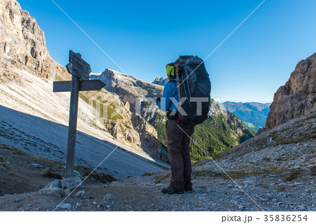 Hiker enjoying view from top of mountain Hiker enjoying view from top of mountain 35836254