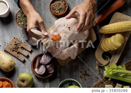 young man preparing a turkey 35850266