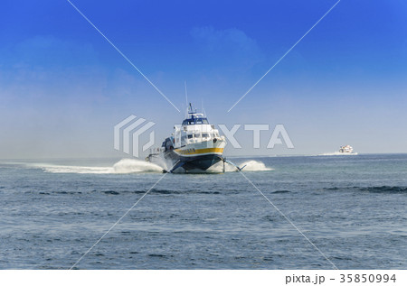 ferries sailing in the sea of the Aeolian Islands 35850994