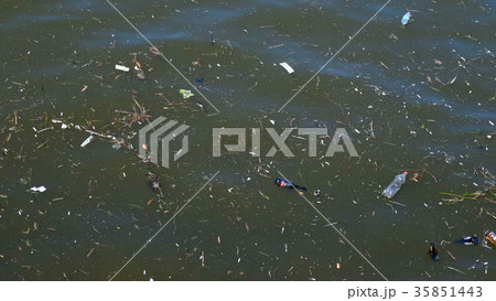 Plastic bags and bottles pollution in ocean washes Plastic bags and bottles pollution in ocean washes 35851443