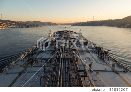 Big tanker is proceeding through Bosphorus strait. Big tanker is proceeding through Bosphorus strait. 35852207