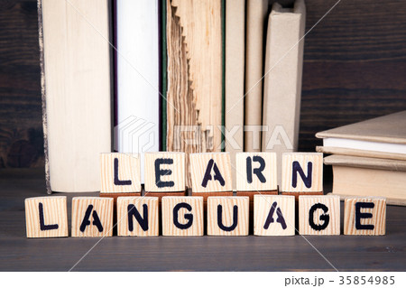 learn language, wooden letters on wooden table. Education, success and communication background learn language, wooden letters on wooden table. Education, success and communication background 35854985