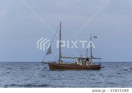 Sailboat on the shores of the island of panarea Sailboat on the shores of the island of panarea 35855389