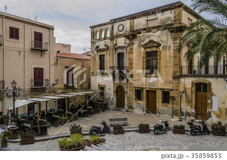 small square and old constructions in Monreale 35859853