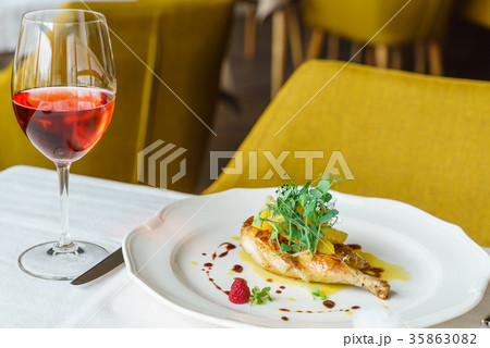 chicken leg with orange fillet and rose wine chicken leg with orange fillet and rose wine 35863082