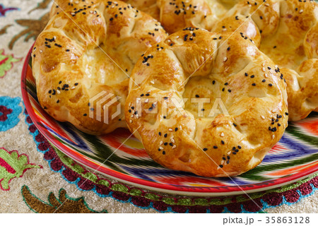 uzbek bread on the wooden board 35863128