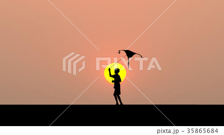 Silhouette of children flying a kite at sunset 35865684