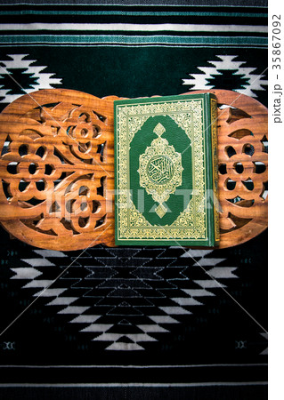 Koran - holy book of Muslims on the carpet Koran - holy book of Muslims on the carpet 35867092