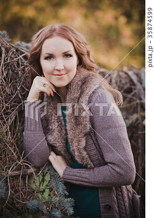 Mysterious adorable young brunette lady  35874599