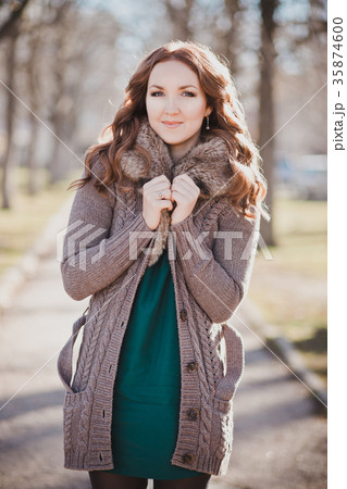 Mysterious adorable young brunette lady  35874600
