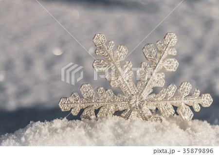 decorative snowflake sticking out of the snow decorative snowflake sticking out of the snow 35879896