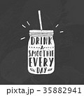 Mason jar with smoothie.  35882941