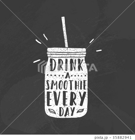 Mason jar with smoothie.  35882941
