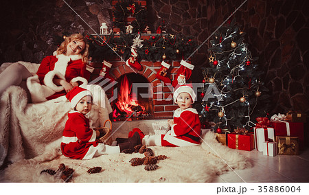 Christmas decorated fireplace Christmas decorated fireplace 35886004