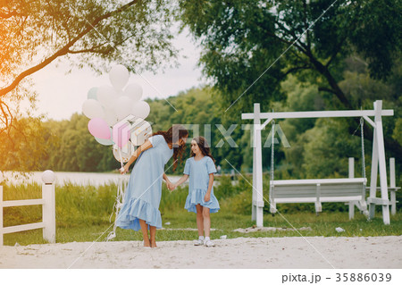 Mother with daughter 35886039