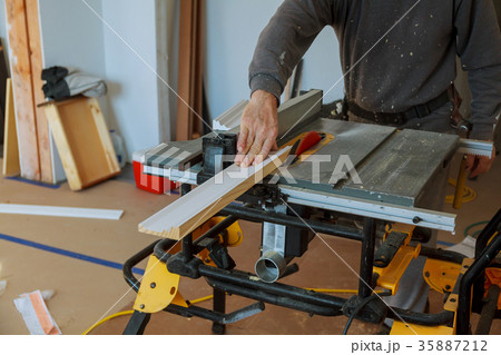 Circular saw cutting wooden plank blade concepts 35887212