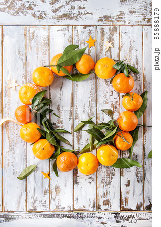 Christmas wreath with tangerines Christmas wreath with tangerines 35888179