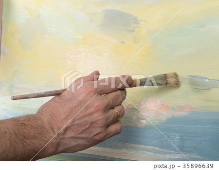 An artist painting in studio An artist painting in studio 35896639