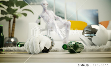 Funny alien with beer sit on sofa. Relax. Alien 35898877