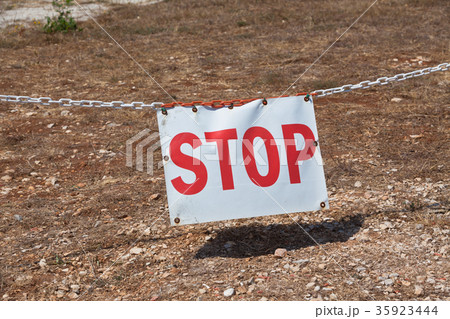 Stop sign restricting entry Stop sign restricting entry 35923444