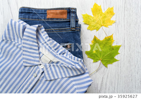 Striped white-blue shirt, jeans and maple leaf Striped white-blue shirt, jeans and maple leaf 35925627