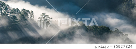 Panorama view of mist moving over mountains Panorama view of mist moving over mountains 35927824