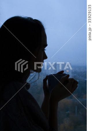 Silhouette of a young beautiful girl Silhouette of a young beautiful girl 35929135