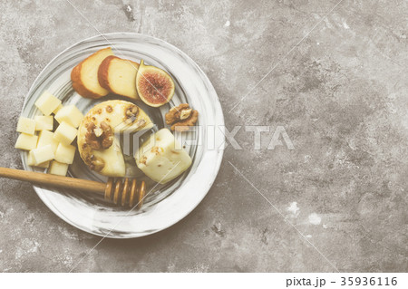 Snacks with wine - various types of cheeses, figs Snacks with wine - various types of cheeses, figs 35936116
