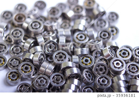 Used ball bearing on white background Used ball bearing on white background 35936181