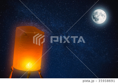 People Release Paper Fire Lamp rising over night 35938691