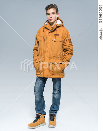 Teenage boy in winter clothes Teenage boy in winter clothes 35960034