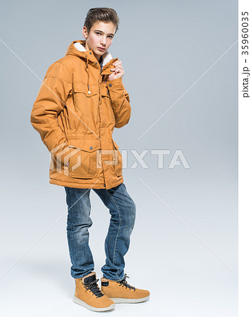 Teenage boy in winter clothes Teenage boy in winter clothes 35960035