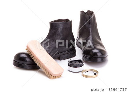 Cleaning and care of shoes on a white background. Cleaning and care of shoes on a white background. 35964737