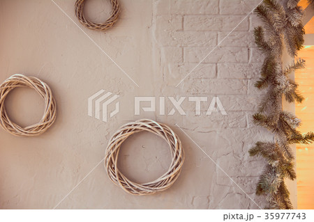 Background woven wreaths of smooth branches Background woven wreaths of smooth branches 35977743