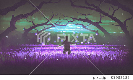 boy standing in the garden of purple flowers boy standing in the garden of purple flowers 35982185