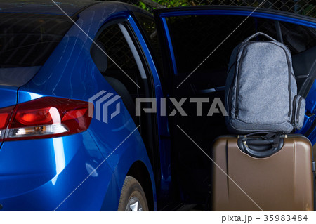 Loading luggage in modern car Loading luggage in modern car 35983484