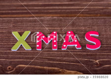 Word Xmas from wooden letters. Word Xmas from wooden letters. 35988020