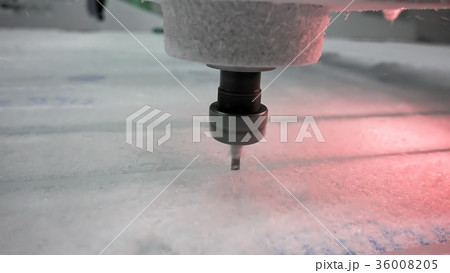 Milling cutter cuts plastic part on robotized line 36008205